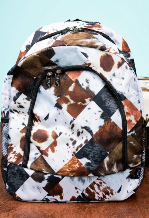 Black brown and white cow hide backpack