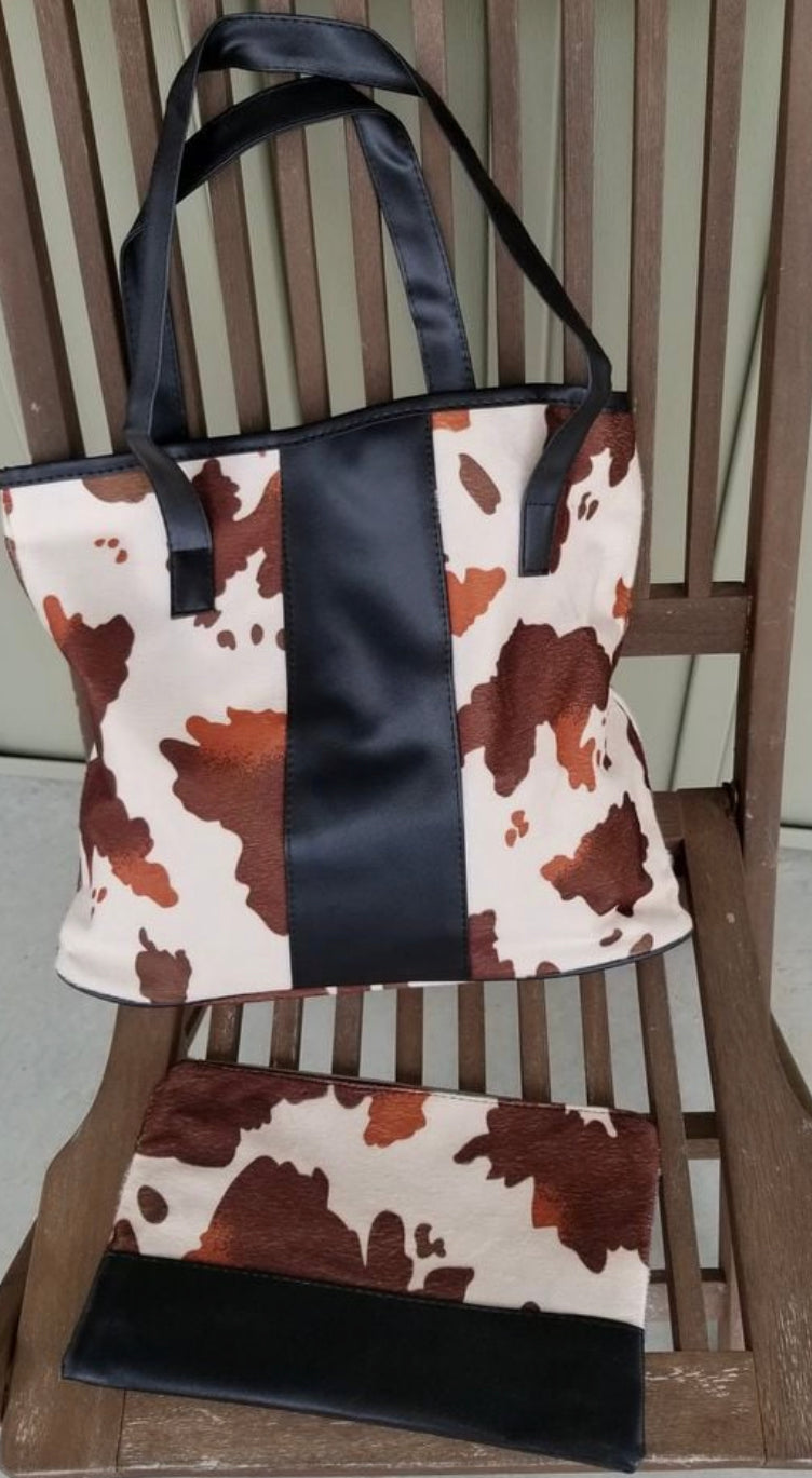 Brown hide print bag and zipper cosmetic bag