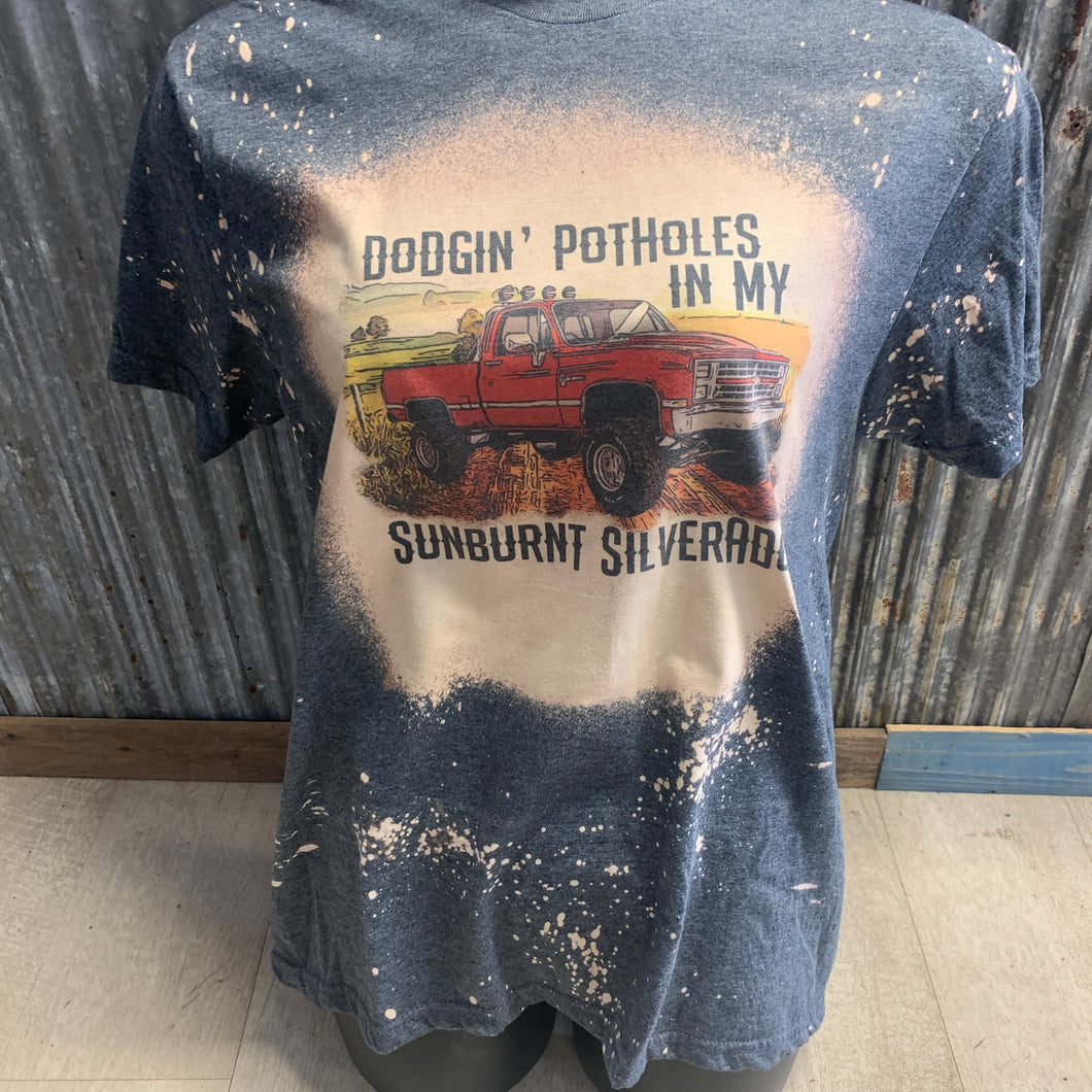 Dodging potholes in my sunburn Silverado bleach t-shirt